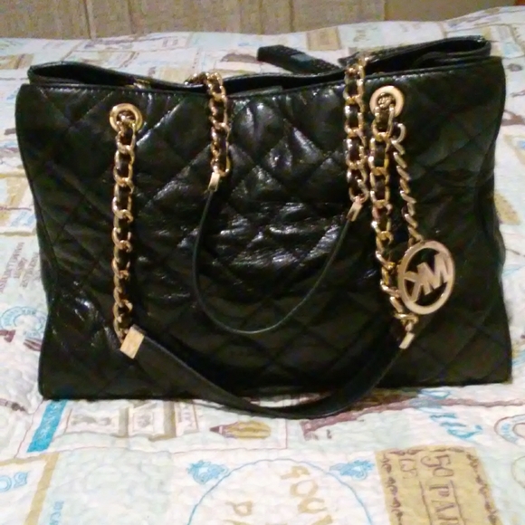 Michael Kors Handbags - MK black caviar leather with gold accents